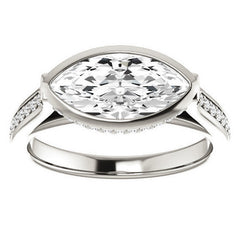 Marquise cut Bezel set Cathedral Engagement Ring