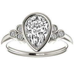 Pear Cut Moissanite Bezel Set Engagement Ring