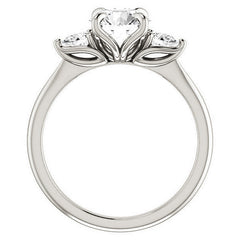 Round Brilliant and Pear Moissanite Engagement Ring