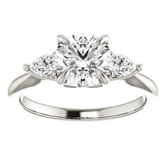 Round Brilliant and Pear Moissanite Engagement Ring