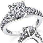 Trellis Cathedral Round Brilliant Moissanite Engagement Ring