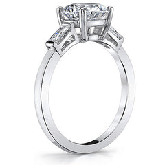 Round Brilliant Moissanite Engagement Ring with Baguette Side Stones