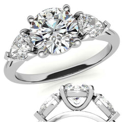 Round Brilliant and Pear Moissanite Three-Stone Ring