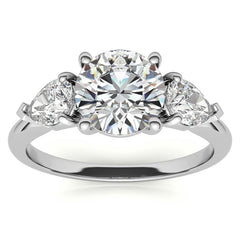 Round Brilliant and Pear Moissanite Three-Stone Ring