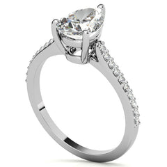 Pear Accented Engagement Ring