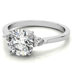 Round Brilliant Moissanite and Diamond Pear 3-Stone Engagement Ring