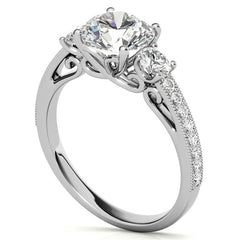 Round Brilliant Moissanite Three-Stone Scroll Accent Engagement Ring