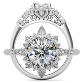 Round and Pear Shared Prong Halo Moissanite Engagement Ring