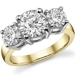 4.0ct (8.5mm,6.0mm) Round Brilliant Moissanite Three Stone Ring