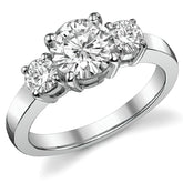 1.75ct (7mm,4mm) Round Brilliant Moissanite Three Stone Ring