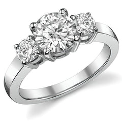1.75ct (7mm,4mm) Round Brilliant Moissanite Three Stone Ring