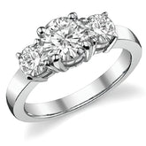 1.7ct (6.5mm,4.5mm) Round Brilliant Moissanite Three Stone Ring