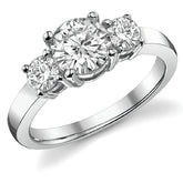 1.5ct (6.5mm,4mm) Round Brilliant Moissanite Three Stone Ring