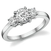 1.05ct (6mm,3.5mm) Round Brilliant Moissanite Three Stone Ring