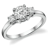 0.95ct (6mm,3mm) Round Brilliant Moissanite Three Stone Ring