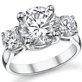 4.5ct (9.5/5mm) Round Brilliant Moissanite Trellis 3 Stone Ring