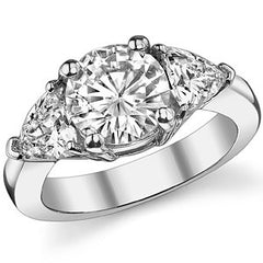 3.25ct (8mm/5.5mm) Round & Trillion Moissanite Three Stone Ring