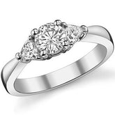 0.82ct (5mm/3.5mm) Round & Trillion Moissanite Three Stone Ring