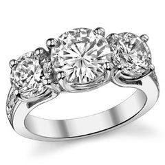 4.25ct (8mm/6.5mm) Round Brilliant Moissanite Trellis Three-Stone Ring
