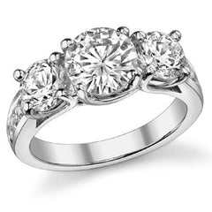 3.8ct (8mm/6mm) Round Brilliant Moissanite Trellis Three-Stone Ring