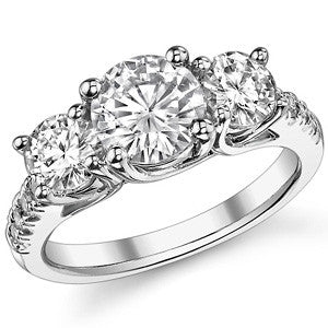 2.4ct (7mm/5mm) Round Brilliant Moissanite Trellis Three-Stone Ring