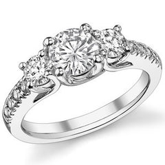 1.7ct (6.5mm/4mm) Round Brilliant Moissanite Trellis Three-Stone Ring