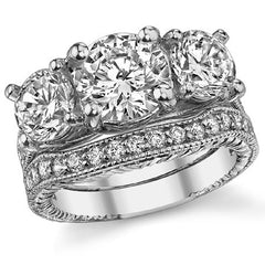 4.2ct (8mm,6.5mm) Round Brilliant Moissanite Antique Trellis 3-Stone Ring