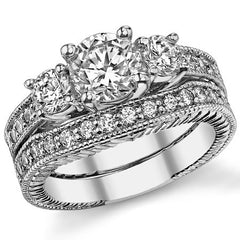 1.9ct (6mm,5mm) Round Brilliant Moissanite Antique Trellis 3-Stone Ring
