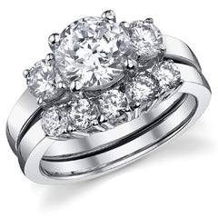 2.2ct (7.5mm,4.5mm) Round Brilliant Moissanite Three Stone Ring