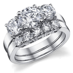 2.25ct (7mm,5mm) Round Brilliant Moissanite Three Stone Ring