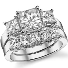3.34ct (7mm/4.5mm) Princess cut Moissanite Three Stone Ring