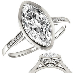 Petite Bezel Marquise cut Moissanite Engagement Ring