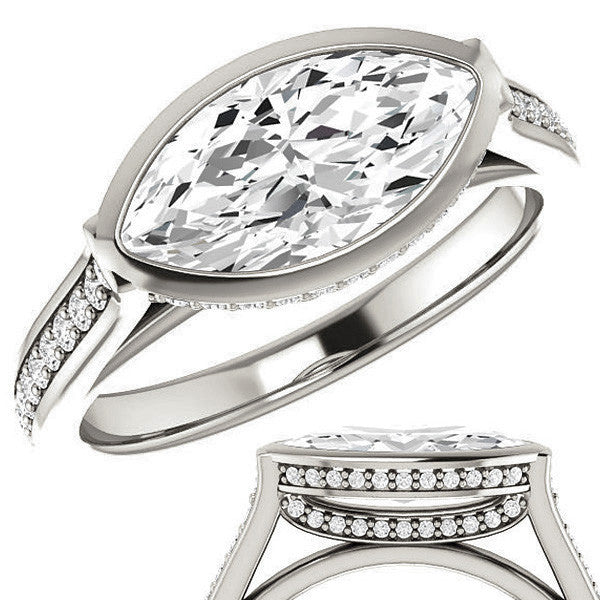 Marquise cut Bezel set Cathedral Engagement Ring