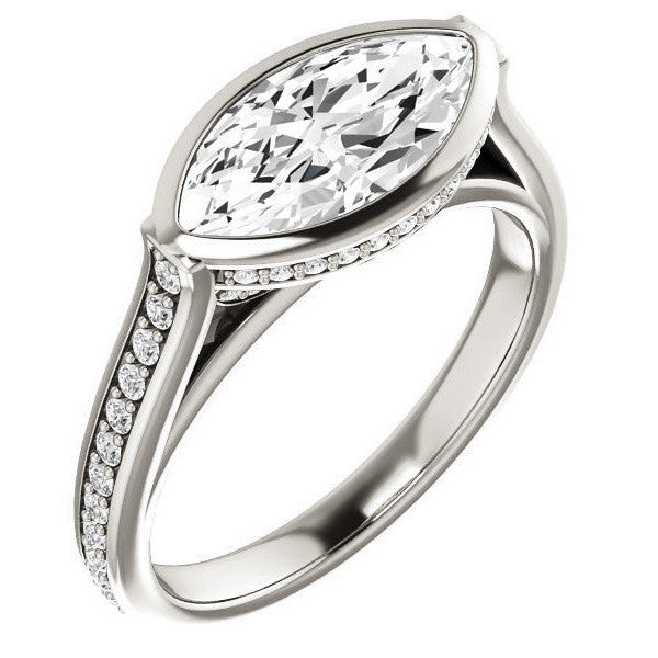 Marquise cut Bezel set Cathedral Engagement Ring