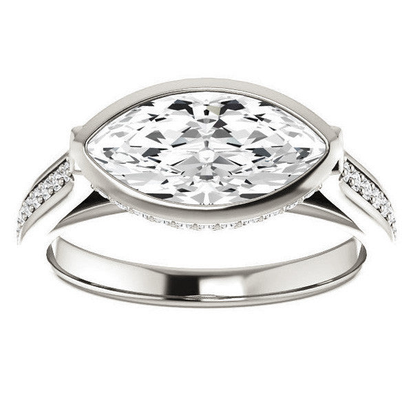 Marquise cut Bezel set Cathedral Engagement Ring