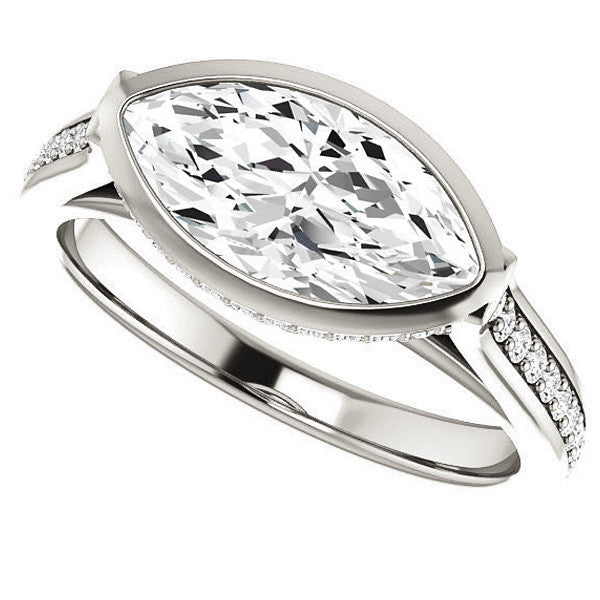 Marquise cut Bezel set Cathedral Engagement Ring