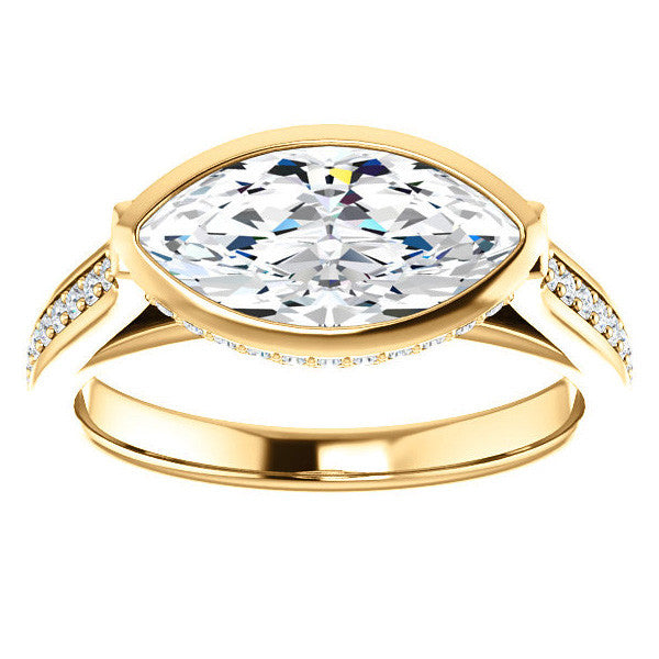 Marquise cut Bezel set Cathedral Engagement Ring