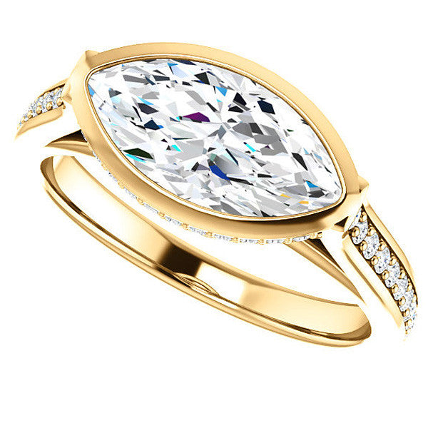 Marquise cut Bezel set Cathedral Engagement Ring