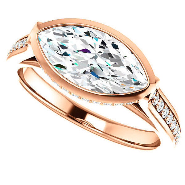 Marquise cut Bezel set Cathedral Engagement Ring