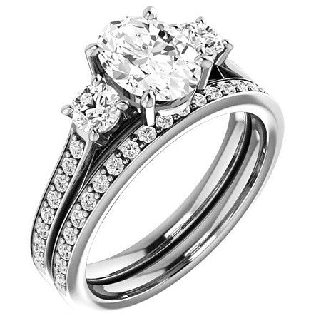 Oval & Round Three-Stone Moissanite Cathedral Engagement Ring