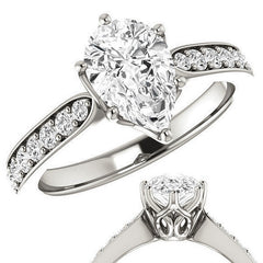 Pear cut Engagement Ring with Pave set Side Stones