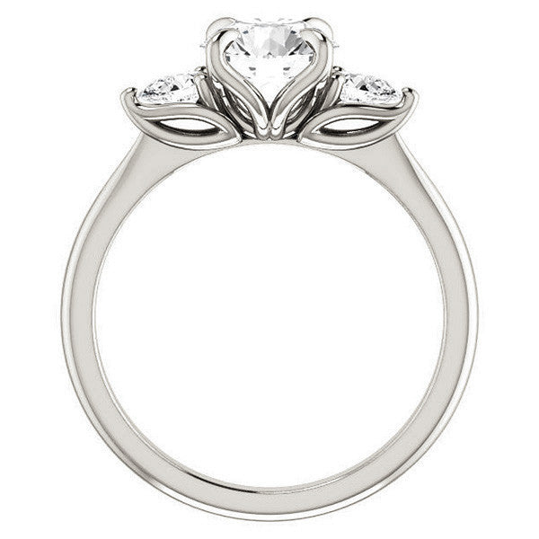 Round Brilliant and Pear Moissanite Engagement Ring