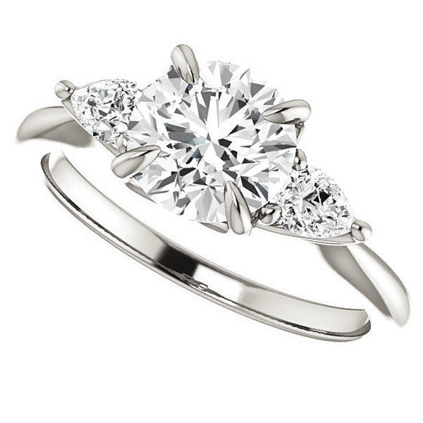 Round Brilliant and Pear Moissanite Engagement Ring