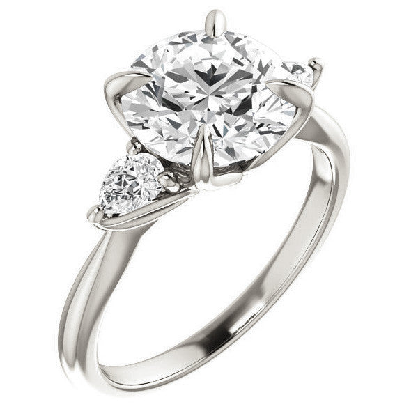 Round Brilliant and Pear Moissanite Engagement Ring