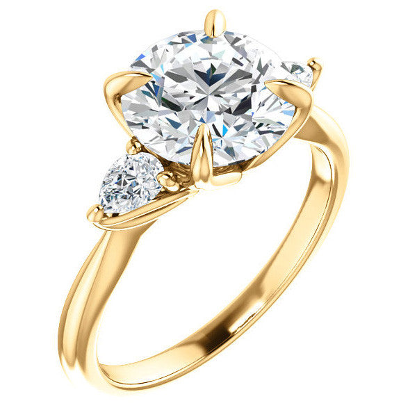 Round Brilliant and Pear Moissanite Engagement Ring