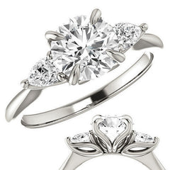 Round Brilliant and Pear Moissanite Engagement Ring
