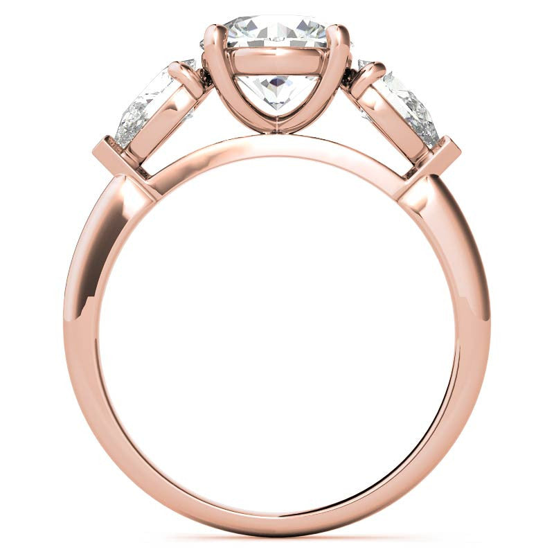 Round Brilliant and Pear Moissanite Three-Stone Ring