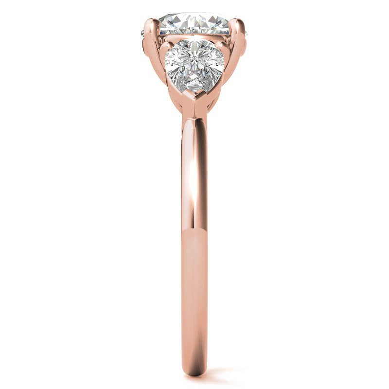 Round Brilliant and Pear Moissanite Three-Stone Ring