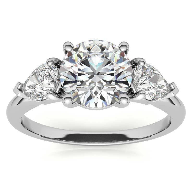 Round Brilliant and Pear Moissanite Three-Stone Ring