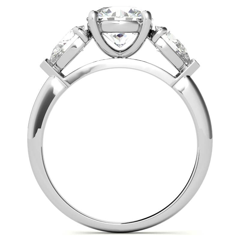 Round Brilliant and Pear Moissanite Three-Stone Ring